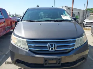 2012 Honda Odyssey EX-L with VIN 5FNRL5H65CB012428, listed as a IAAI auction lot 42164272 with 256,253 mi miles and . Bid and sale history available at carsss.com. Image 12.