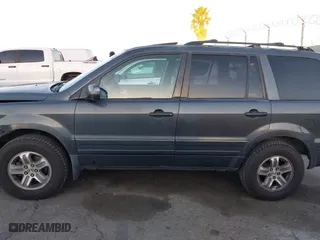2005 Honda Pilot EX-L with NAVI with VIN 2HKYF187X5H514571, listed as a IAAI auction lot 41746538 with 276,994 mi miles. Bid and sale history available at carsss.com. Image 14.