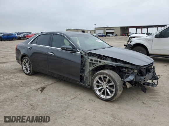 2017 Cadillac CTS Luxury AWD with VIN 1G6AX5SX1H0154089, listed as a Copart auction lot 54744095 with 90,851 mi miles and Salvage title. Bid and sale history available at DreamBid. Image 4.