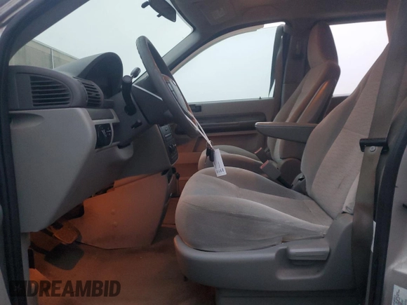 2005 Ford Freestar S z VIN 2FMZA506X5BA51187, wystawiony jako Copart lot #84252984 z przebiegiem 115 747 mil mil oraz Czysty tytuł • Clean title. Historia ofert i sprzedaży dostępna na DreamBid. Obrazek 7.