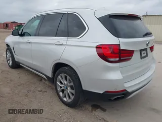 2018 BMW X5 xDrive35i with VIN 5UXKR0C51J0X91452, listed as a IAAI auction lot 41886539 with 39,521 mi miles. Bid and sale history available at carsss.com. Image 3.