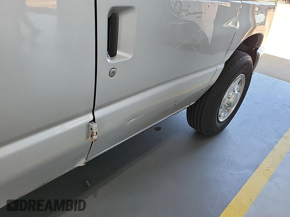 2013 Ford Econoline Cargo with VIN 1FTNS2EL5DDA38031, listed as a IAAI auction lot 42731967 with 116,056 mi miles and . Bid and sale history available at DreamBid. Image 28.