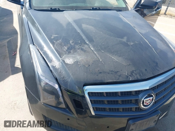 2013 Cadillac ATS z VIN 1G6AA5RA8D0139683, wystawiony jako IAAI lot #42410090 z przebiegiem 127 323 mil mil oraz . Historia ofert i sprzedaży dostępna na DreamBid. Obrazek 6.
