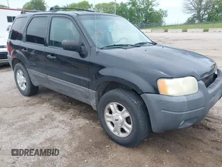 2003 Ford Escape XLT Popular 2 z VIN 1FMYU93153KB00986, wystawiony jako IAAI lot #42418371 z przebiegiem 211 348 mil mil oraz . Historia ofert i sprzedaży dostępna na DreamBid. Obrazek 1.