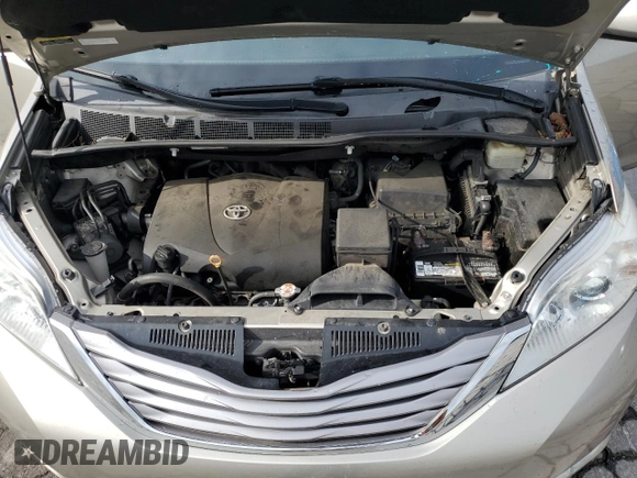 2017 Toyota Sienna XLE with VIN 5TDDZ3DC7HS170619, listed as a Copart auction lot 58575075 with 153,184 mi miles and Clean title. Bid and sale history available at DreamBid. Image 12.
