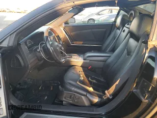 2004 Cadillac XLR z VIN 1G6YV34A445602565, wystawiony jako Copart lot #84011204 z przebiegiem Nie podano mil oraz Tytuł czysty. Historia ofert i sprzedaży dostępna na DreamBid. Obrazek 7.