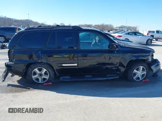 2004 GMC Envoy SLE z VIN 1GKDT13SX42416096, wystawiony jako IAAI lot #41695510 z przebiegiem 240 658 mil mil oraz . Historia ofert i sprzedaży dostępna na DreamBid. Obrazek 13.