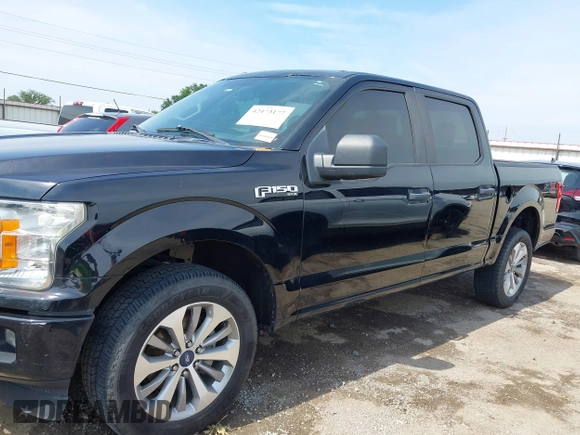 2018 Ford F-150 XL with VIN 1FTEW1EP1JKD05142, listed as a IAAI auction lot 42473177 with 99,079 mi miles and . Bid and sale history available at DreamBid. Image 15.