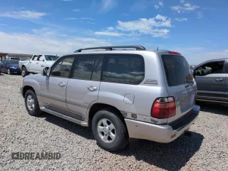 2000 Toyota Land Cruiser z VIN JT3HT05J5Y0118136, wystawiony jako Copart lot #60333115 z przebiegiem 184 284 mil mil oraz Czysty tytuł • Clean title. Historia ofert i sprzedaży dostępna na DreamBid. Obrazek 2.