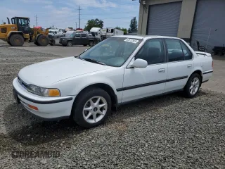 1992 Honda Accord with VIN JHMCB767XNC005036, listed as a Copart auction lot 62573565 with 193,633 mi miles and Clean title. Bid and sale history available at DreamBid. Image 1.