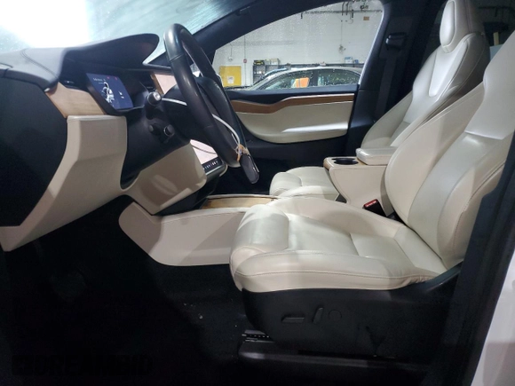 2020 Tesla Model X Long Range with VIN 5YJXCBE26LF228781, listed as a Copart auction lot 46417835 with 46,148 mi miles and Salvage Title. Bid and sale history available at DreamBid. Image 7.