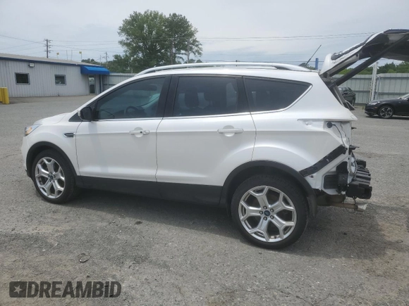 2019 Ford Escape Titanium with VIN 1FMCU0J94KUC02894, listed as a Copart auction lot 55352225 with 67,926 mi miles and Salvage title. Bid and sale history available at DreamBid. Image 2.