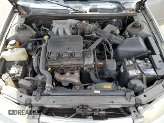 2001 Toyota Camry LE z VIN JT2BF22K310338343, wystawiony jako Copart lot #45181715 z przebiegiem 183 500 mil mil oraz Szkoda całkowita • Salvage title. Historia ofert i sprzedaży dostępna na DreamBid. Obrazek 11.