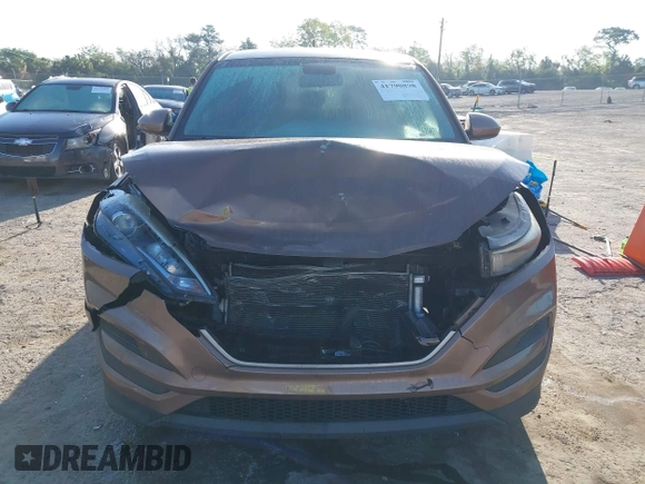 2017 Hyundai Tucson SE with VIN KM8J23A40HU525982, listed as a IAAI auction lot 41790898 with 107,715 mi miles. Bid and sale history available at carsss.com. Image 12.