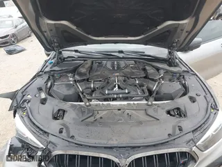 2020 BMW M8 with VIN WBSAE0C02LCE17524, listed as a IAAI auction lot 41374594 with 48,197 mi miles. Bid and sale history available at carsss.com. Image 10.