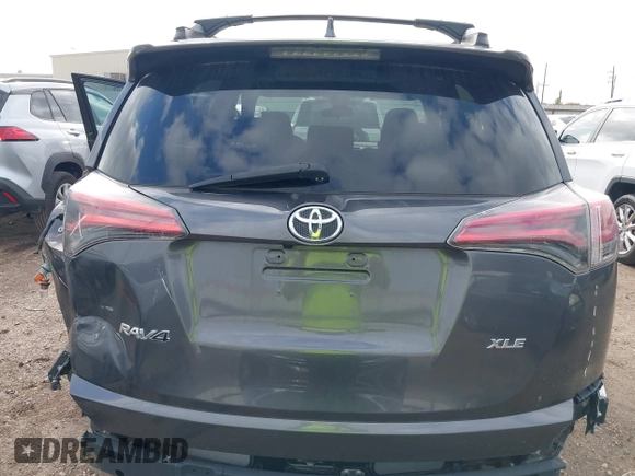 2018 Toyota RAV4 XLE with VIN 2T3WFREV4JW417555, listed as a IAAI auction lot 41092589 with 93,788 mi miles and . Bid and sale history available at DreamBid. Image 17.