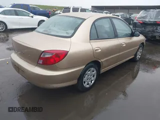 2002 Kia Rio with VIN KNADC123626192611, listed as a IAAI auction lot 41765104 with 62,387 mi miles. Bid and sale history available at carsss.com. Image 4.