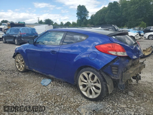 2013 Hyundai Veloster w/Gray Int with VIN KMHTC6AD5DU102803, listed as a Copart auction lot 58628935 with 129,616 mi miles and Salvage title. Bid and sale history available at DreamBid. Image 2.