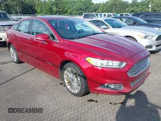2014 Ford Fusion SE Hybrid with VIN 3FA6P0LU4ER125844, listed as a IAAI auction lot 42490676 with 246,821 mi miles and . Bid and sale history available at DreamBid. Image 1.