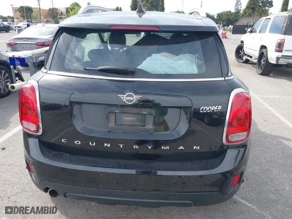 2020 MINI Countryman Cooper with VIN WMZYW3C04L3M24637, listed as a IAAI auction lot 41677154 with 34,786 mi miles. Bid and sale history available at carsss.com. Image 16.