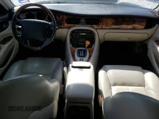 2002 Jaguar XJ with VIN SAJDA15BX2MF47193, listed as a Copart auction lot 49065275 with 69,544 mi miles and Salvage title. Bid and sale history available at DreamBid. Image 8.