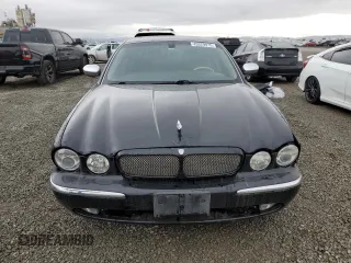 2004 Jaguar XJ VDP with VIN SAJWA74C54SG16196, listed as a Copart auction lot 45329975 with 109,265 mi miles and Salvage Title. Bid and sale history available at carsss.com. Image 5.