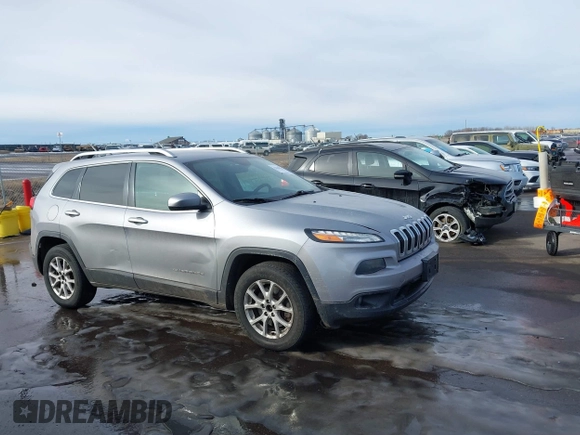 2014 Jeep Cherokee Latitude with VIN 1C4PJMCS9EW122196, listed as a IAAI auction lot 41649757 with 205,363 mi miles and . Bid and sale history available at DreamBid. Image 13.