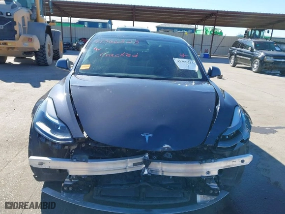 2022 Tesla Model 3 Long Range with VIN 5YJ3E1EB9NF197127, listed as a IAAI auction lot 41366323 with 56,559 mi miles. Bid and sale history available at carsss.com. Image 6.