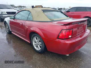 2004 Ford Mustang Deluxe with VIN 1FAFP44624F197158, listed as a IAAI auction lot 41712280 with 136,762 mi miles. Bid and sale history available at carsss.com. Image 3.