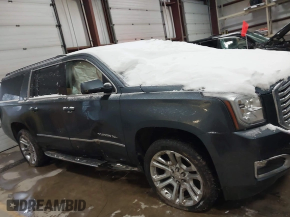 2019 GMC Yukon XL SLT with VIN 1GKS2GKC5KR137005, listed as a IAAI auction lot 41435370 with 125,453 mi miles and . Bid and sale history available at carsss.com. Image 12.
