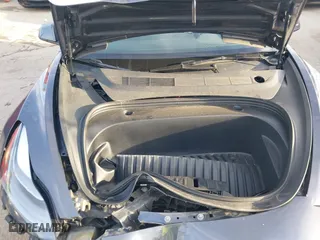 2023 Tesla Model 3 with VIN 5YJ3E1EA9PF569494, listed as a IAAI auction lot 41798014 with 18,372 mi miles. Bid and sale history available at carsss.com. Image 10.