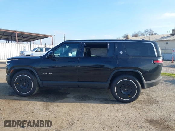 2025 Rivian R1S Adventure with VIN 7PDSGBBAXSN055849, listed as a IAAI auction lot 41255282 with 2,885 mi miles. Bid and sale history available at carsss.com. Image 15.