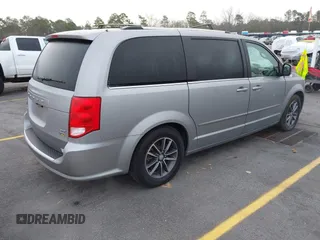 2017 Dodge Grand Caravan SXT with VIN 2C4RDGCG9HR677157, listed as a IAAI auction lot 41470342 with 66,611 mi miles and . Bid and sale history available at DreamBid. Image 4.