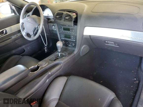 2002 Ford Thunderbird Hardtop Premium z VIN 1FAHP60A52Y130277, wystawiony jako Copart lot #69473594 z przebiegiem Nie podano mil oraz Szkoda całkowita • Salvage title. Historia ofert i sprzedaży dostępna na DreamBid. Obrazek 8.
