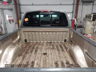 1999 Ford F-150 with VIN 1FTRX18W0XKA68363, listed as a IAAI auction lot 41524104 with 218,400 mi miles and . Bid and sale history available at DreamBid. Image 12.