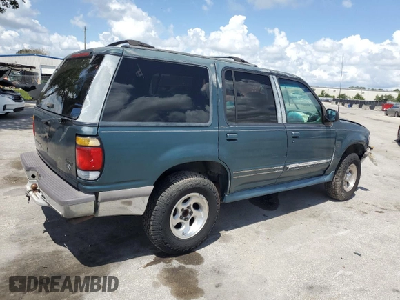 1997 Ford Explorer XLT с VIN 1FMDU32PXVUD09813, выставлен на аукционе Copart как лот 61066325 с пробегом 222 538 миль миль и Списание • Salvage title. История ставок и продаж доступна на DreamBid. Изображение 3.