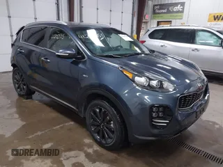 2019 Kia Sportage EX z VIN KNDPNCAC0K7575087, wystawiony jako IAAI lot #41202355 z przebiegiem 31 768 mil mil oraz . Historia ofert i sprzedaży dostępna na DreamBid. Obrazek 1.