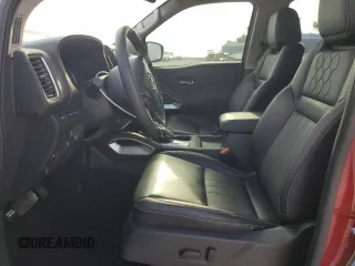 2024 Nissan Frontier SL with VIN 1N6ED1EK4RN659447, listed as a Copart auction lot 53338105 with 4,895 mi miles and Salvage title. Bid and sale history available at DreamBid. Image 7.