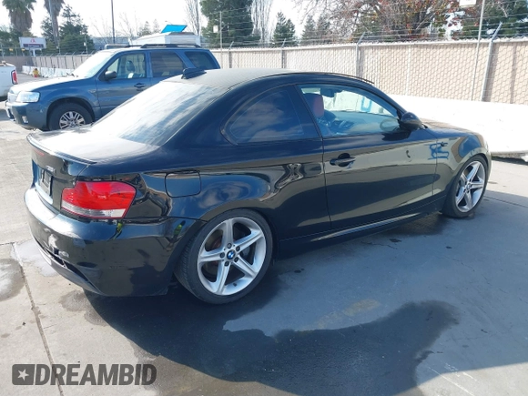 2008 BMW 1 Series 135i with VIN WBAUC73548VF25411, listed as a IAAI auction lot 41479409 with 153,643 mi miles. Bid and sale history available at carsss.com. Image 4.
