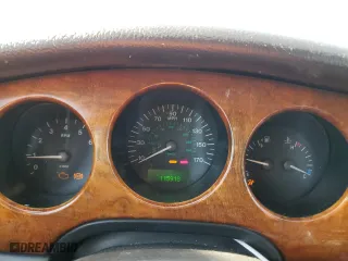 2000 Jaguar XJ with VIN SAJDA14C9YLF17465, listed as a Copart auction lot 75537214 with 115,918 mi miles and Salvage Title. Bid and sale history available at carsss.com. Image 9.