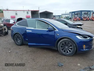 2018 Tesla Model X 75D with VIN 5YJXCAE2XJF111180, listed as a IAAI auction lot 41988079 with 114,593 mi miles and . Bid and sale history available at DreamBid. Image 13.