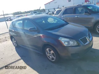 2009 Pontiac Vibe w/1SA with VIN 5Y2SL67839Z442052, listed as a IAAI auction lot 41885452 with 300,991 mi miles. Bid and sale history available at carsss.com. Image 1.
