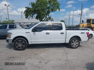 2018 Ford F-150 XL with VIN 1FTEW1CB8JFC47174, listed as a IAAI auction lot 41956391 with 148,337 mi miles. Bid and sale history available at carsss.com. Image 14.