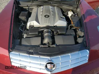 2006 Cadillac XLR z VIN 1G6YV36A465601366, wystawiony jako Copart lot #76229944 z przebiegiem 33 159 mil mil oraz Nie do naprawy. Historia ofert i sprzedaży dostępna na DreamBid. Obrazek 11.