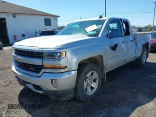 2018 Chevrolet Silverado 1500 LT with VIN 1GCVKREC8JZ237565, listed as a IAAI auction lot 42052619 with 92,790 mi miles and . Bid and sale history available at DreamBid. Image 17.