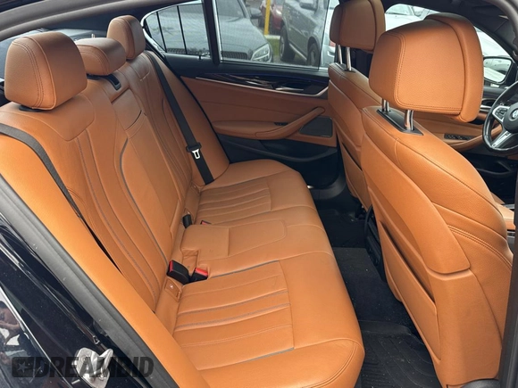 2018 BMW 5 Series M550i xDrive with VIN WBAJB9C57JB035521, listed as a Copart auction lot 54177125 with 63,924 mi miles and Clean Title. Bid and sale history available at carsss.com. Image 6.