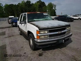 1998 Chevrolet Tahoe z VIN 1GNEK13R7WJ348565, wystawiony jako Copart lot #53375725 z przebiegiem 176 919 mil mil oraz Szkoda całkowita • Salvage title. Historia ofert i sprzedaży dostępna na DreamBid. Obrazek 12.