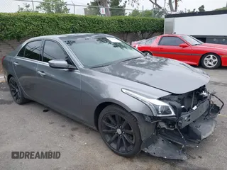 2019 Cadillac CTS Luxury RWD z VIN 1G6AR5SX4K0136929, wystawiony jako IAAI lot #42349128 z przebiegiem 23 014 mil mil oraz . Historia ofert i sprzedaży dostępna na DreamBid. Obrazek 1.