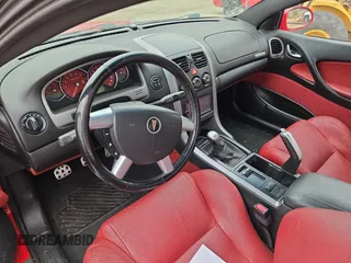 2004 Pontiac GTO with VIN 6G2VX12G94L240323, listed as a Copart auction lot 79459454 with 148,000 mi miles and Clean Title. Bid and sale history available at carsss.com. Image 9.