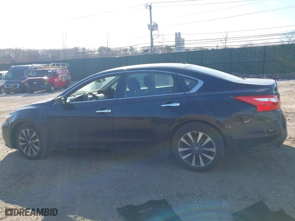 2017 Nissan Altima 2.5 SR with VIN 1N4AL3AP9HC265993, listed as a IAAI auction lot 41627180 with 142,994 mi miles. Bid and sale history available at carsss.com. Image 14.